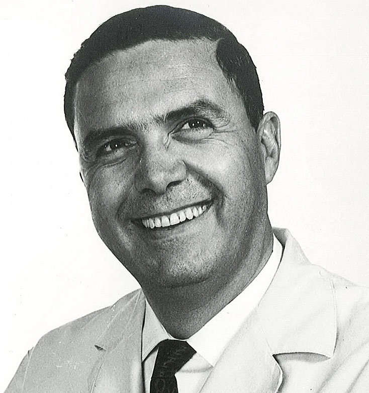 Black and white portrait photograph of Luis Grana